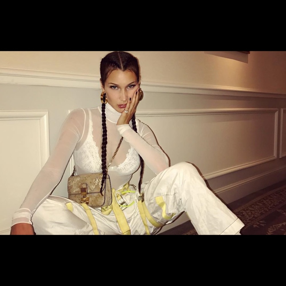 Danielle Guizio white mesh bodysuit